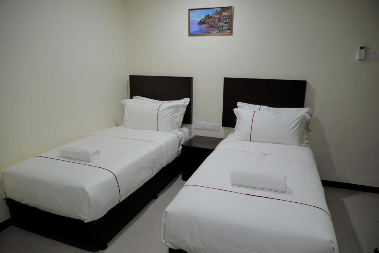 Dcozy Hotel Perai Exterior photo